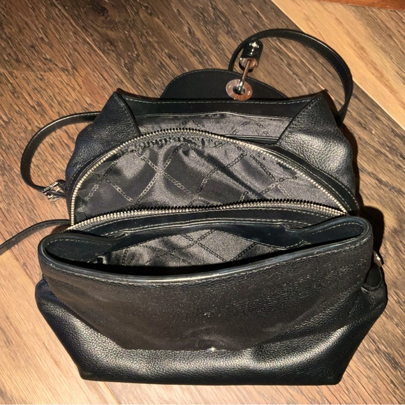 Michael Kors Raven Medium Pebbled Backpack
Black leather with silver hardware - Picture 8 of 13